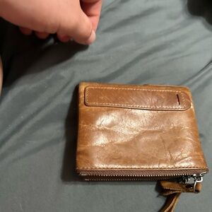 Brown wallet used but a lot of life left in it.